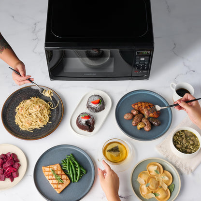 Farberware 0.7 Cu. Ft. Countertop Microwave Oven – 700 Watts Power, Auto Cook Settings, Defrost, Easy Clean and Child Safety Lock - Black